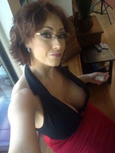 busty-milf-glasses-cleavage